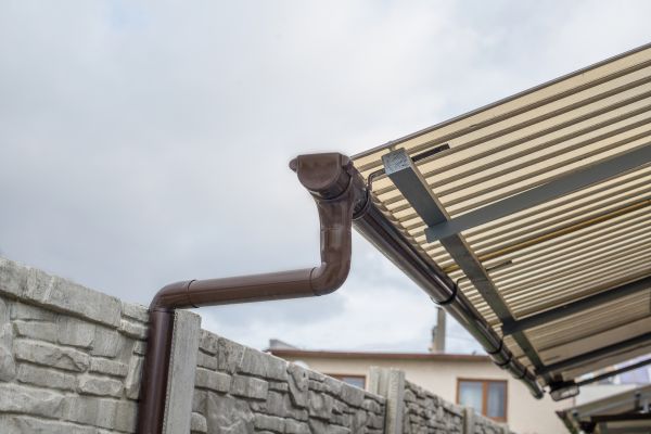 Plastic Downspout Installation in Davis